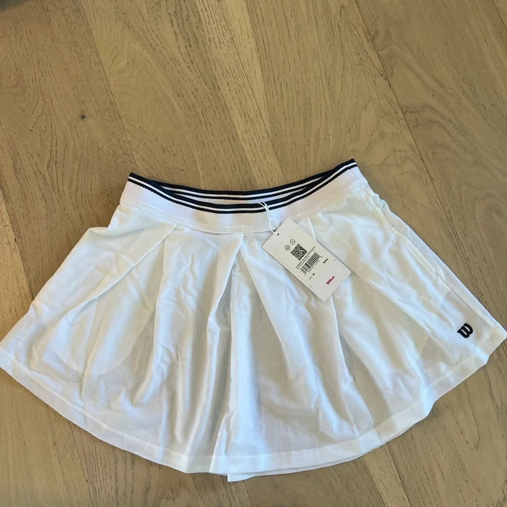 Wilson White Tennis Skirt with Navy Trim - Picture 1 of 4